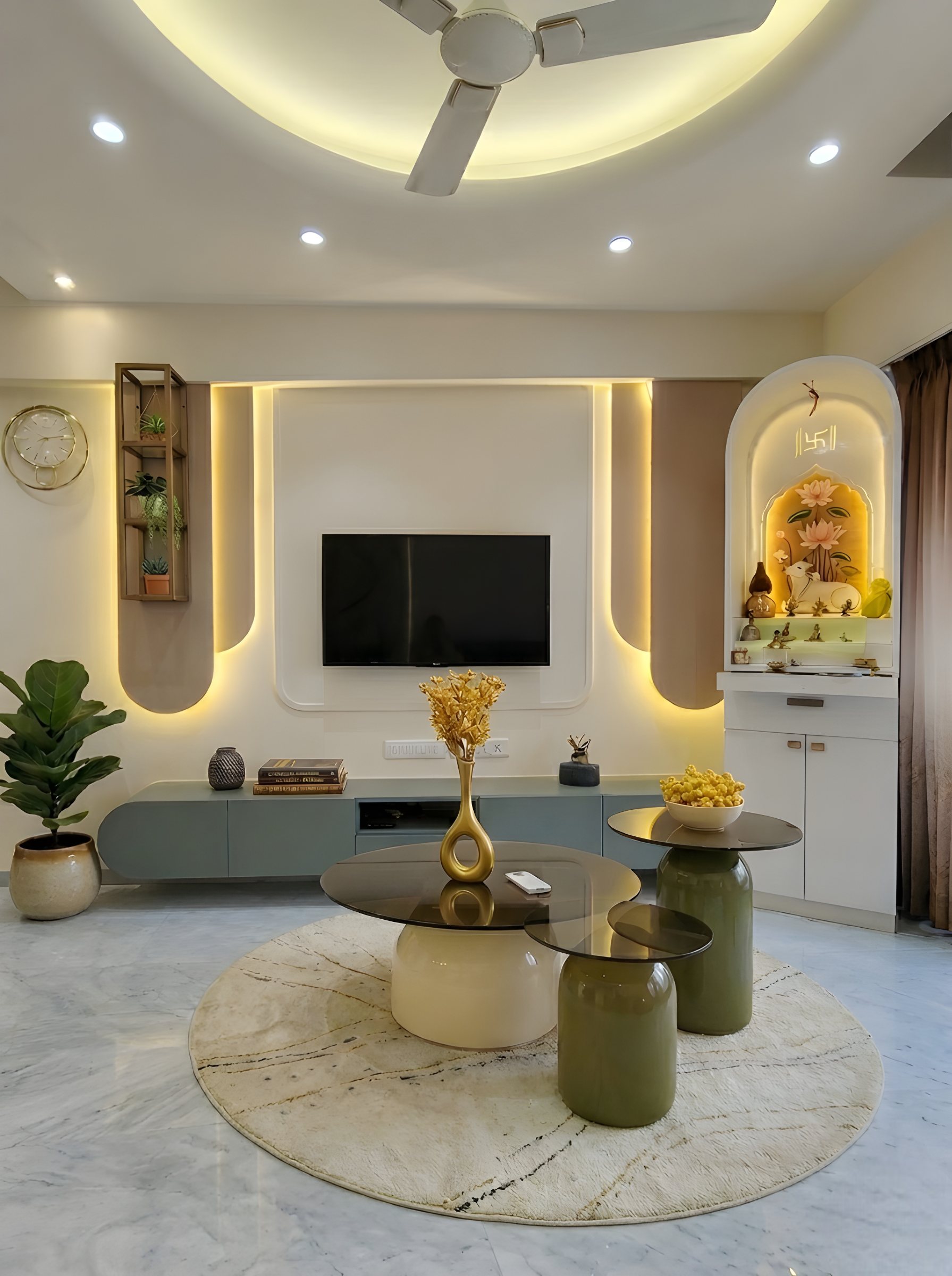 Living room by Ranzospace Mumbai with cove lighting and a pooja niche
