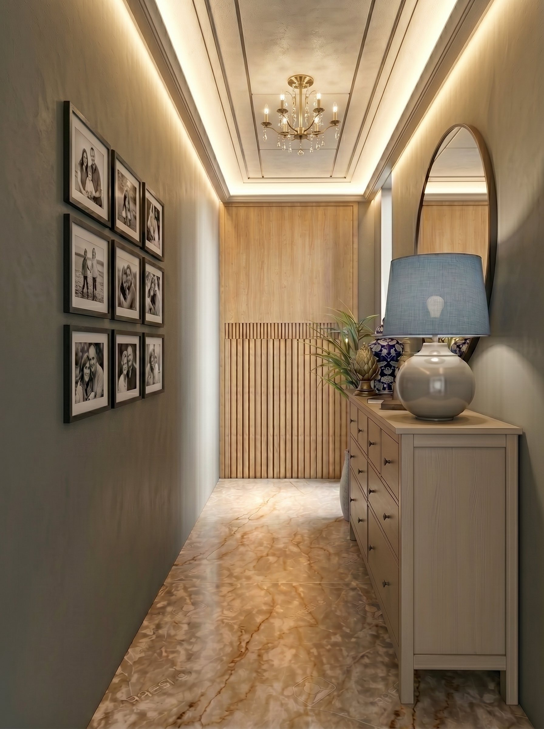 Entry passage by Ranzospace Mumbai with a gallery wall and cove lighting