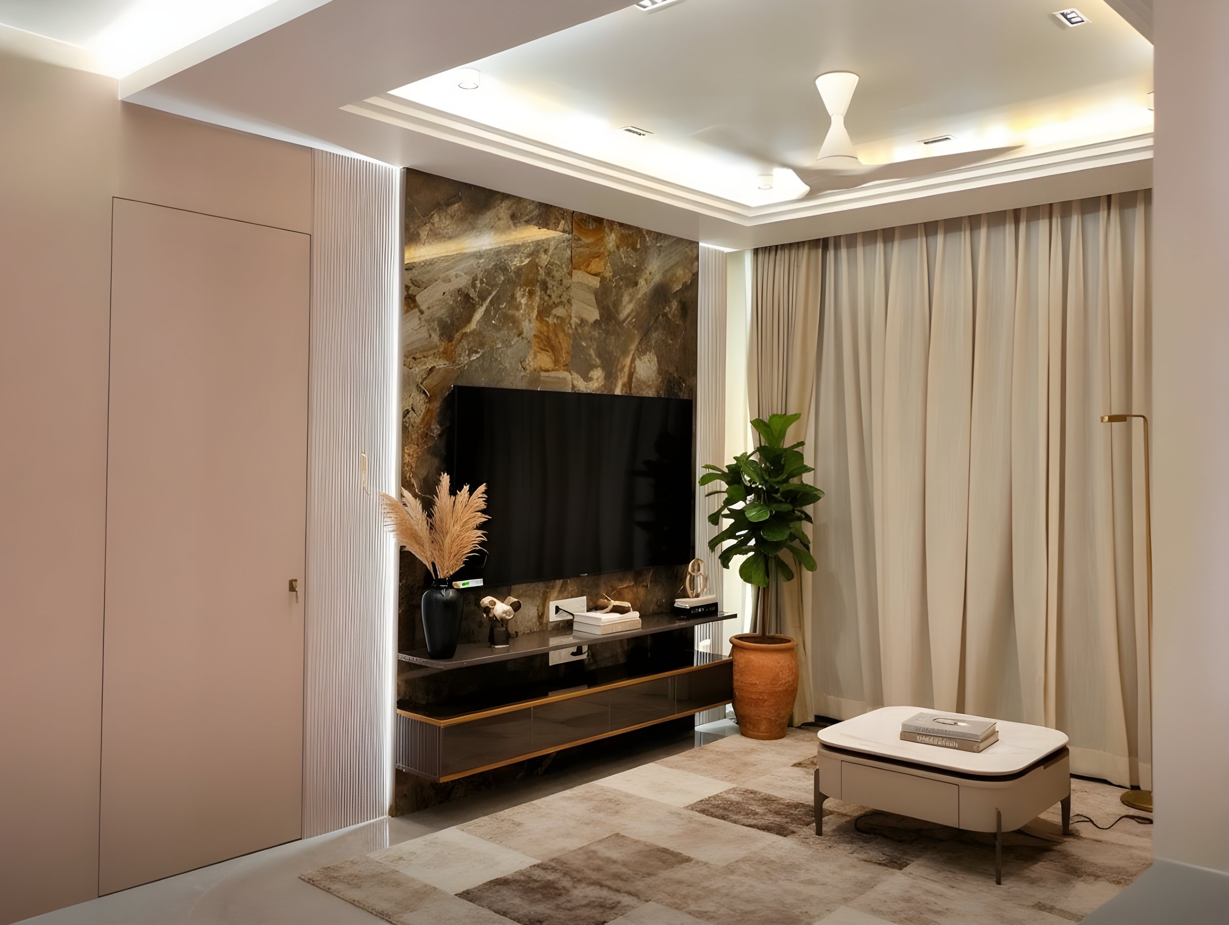 Living room by Ranzospace Mumbai with a panelled TV wall and soft daylight