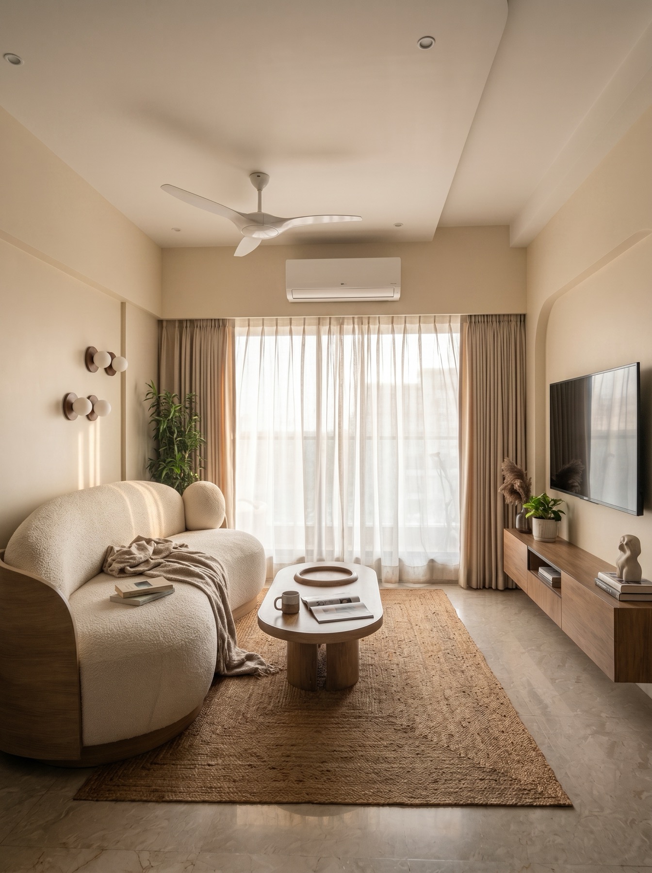 Living room wall detail Mumbai by Ranzospace - textured finishes and layered greenery